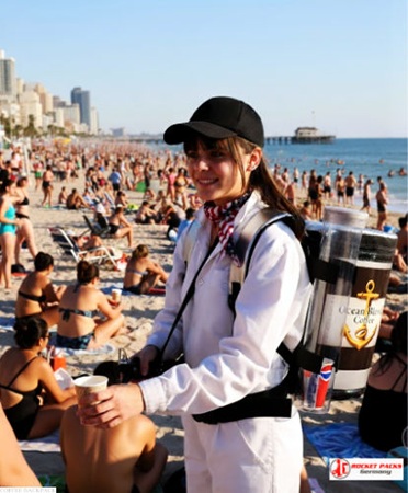 Coffee Seller Backpack dispensing Espresso at Warsaw open air concert, maximizing customer interaction, brand campaign awareness, and live beverage activations within festive event environments.